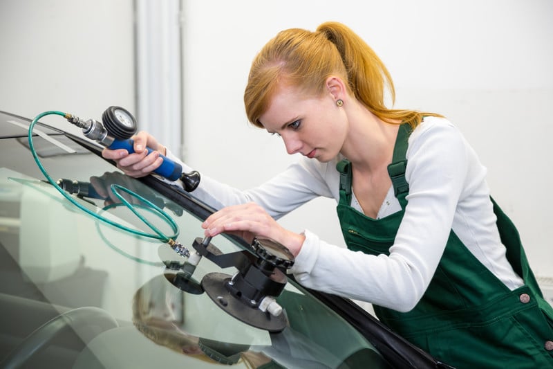 girl repairing windscreen